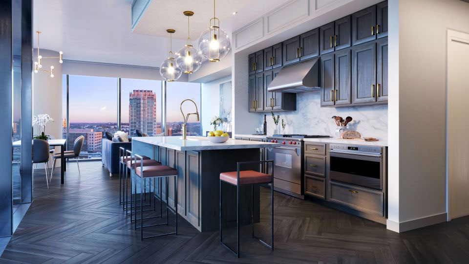 Crews top out first tower at Broadwest development, sales gallery for condos is now open